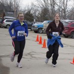 Runners and Walkers at the finish line for Spear's 2nd Annual Shamrock Shuffle 5K Health Walk/Run