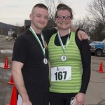 Runners and Walkers at the finish line for Spear's 2nd Annual Shamrock Shuffle 5K Health Walk/Run