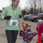 Runners and Walkers at the finish line for Spear's 2nd Annual Shamrock Shuffle 5K Health Walk/Run