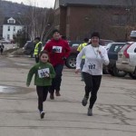 Runners and Walkers at the finish line for Spear's 2nd Annual Shamrock Shuffle 5K Health Walk/Run