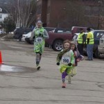 Runners and Walkers at the finish line for Spear's 2nd Annual Shamrock Shuffle 5K Health Walk/Run