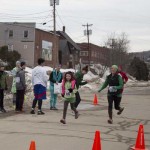 Runners and Walkers at the finish line for Spear's 2nd Annual Shamrock Shuffle 5K Health Walk/Run