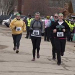 Runners and Walkers at the finish line for Spear's 2nd Annual Shamrock Shuffle 5K Health Walk/Run