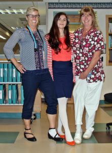 med surg team members at Speare helping raise awareness for PAD by wearing one white sock