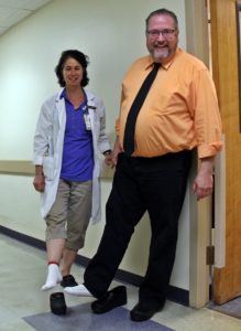 nutrition team members at Speare helping raise awareness for PAD by wearing one white sock