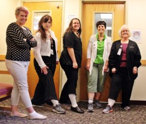 Speare Registration team at Speare helping raise awareness for PAD by wearing one white sock