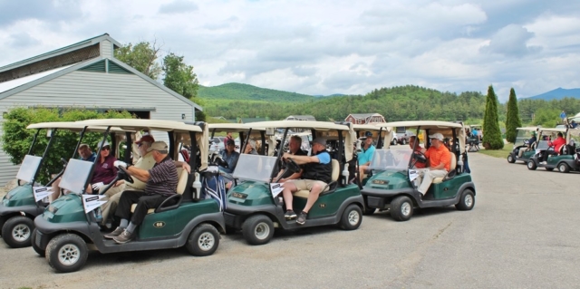 Carts heading out to course