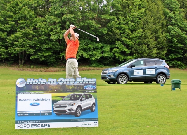 Hole In One Wins Sponsor - Robert H Irwin Motors with golfer