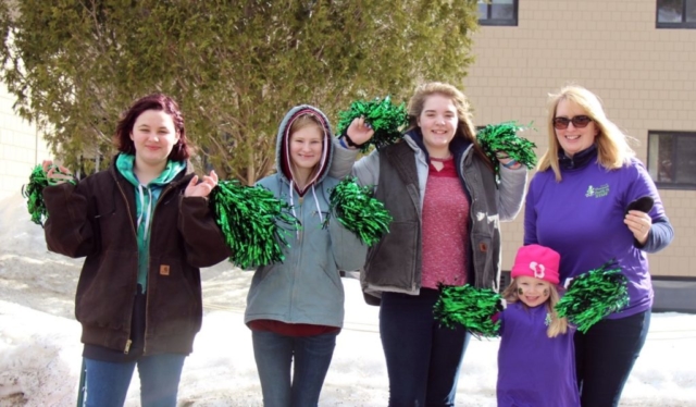 Cheerleaders at Fnish Line at 6th annual Speare Shamrock Shuffle